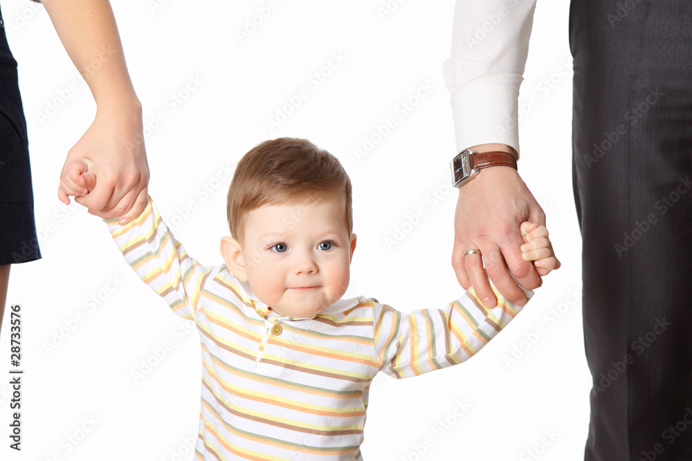The little boy hold the parent's hands The little boy hold the parent's hands