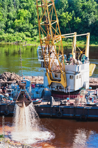 Photography River  deepening by a special dredge