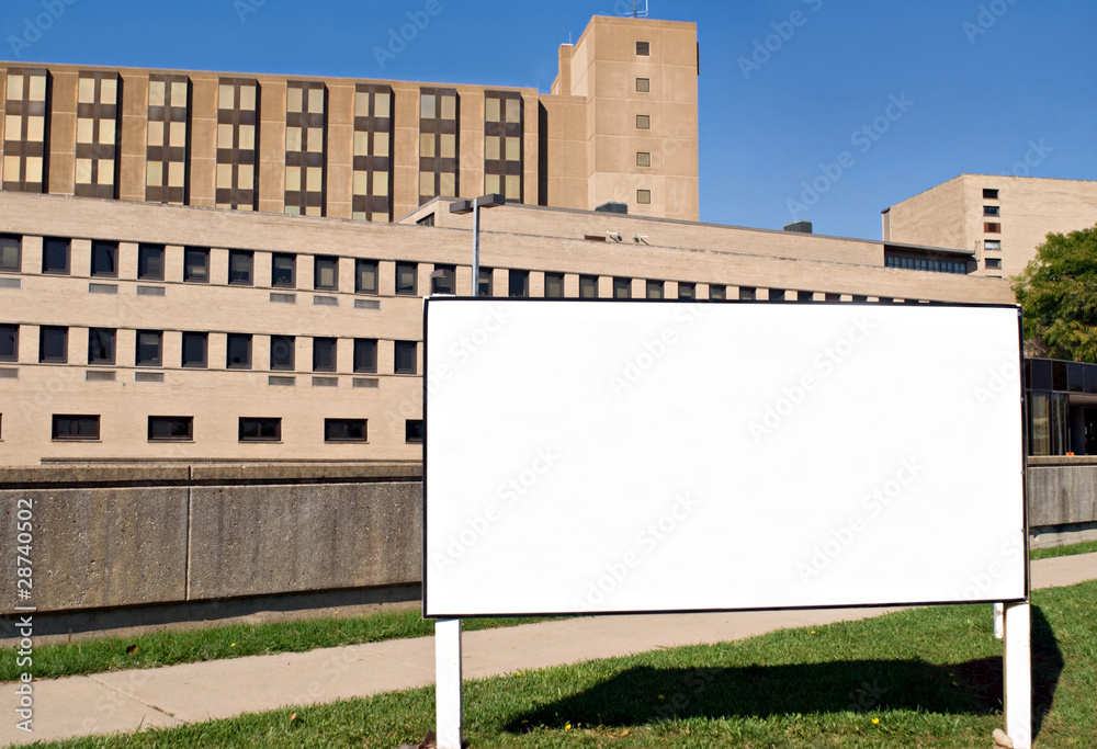 Fototapeta premium Sign with Distant Building