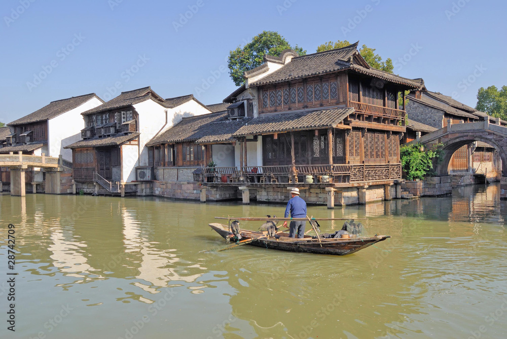 Fototapeta premium Fishing with cormorants at Shanghai Xizha old village