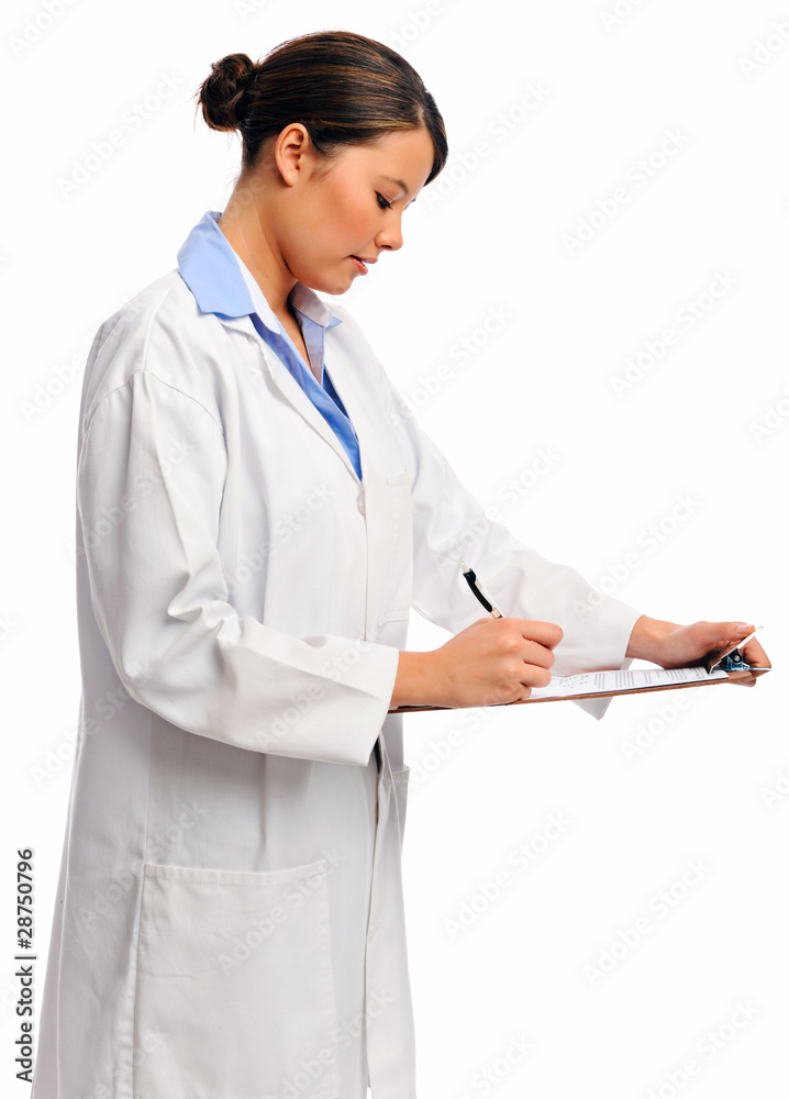 Medical doctor writing on clipboard Medical doctor writing on clipboard