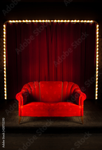 red sofa on the stage