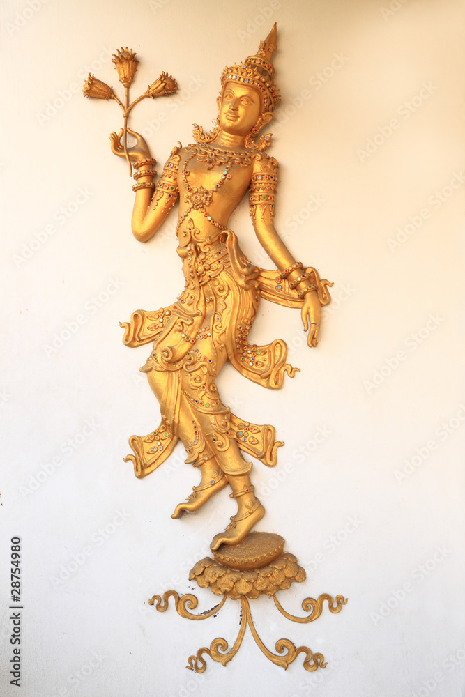 Decorative dance on temple wall.