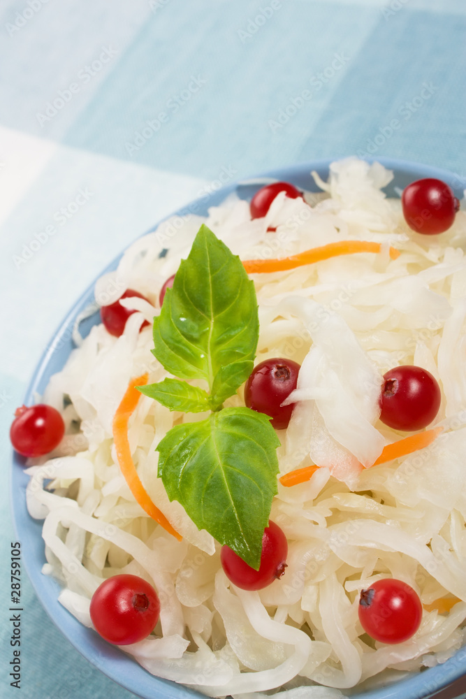 Sauerkraut salad with cranberries, carrot and basil Sauerkraut salad with cranberries, carrot and basil