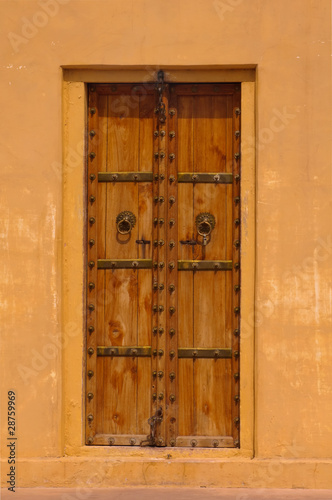 very decorative entrance door to indian residence in jaipur indi