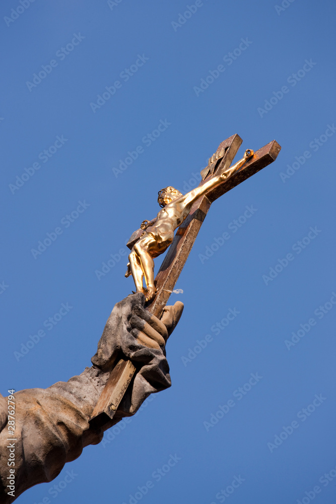 Fototapeta premium Fragment of the statue of the Saint Nepomucen