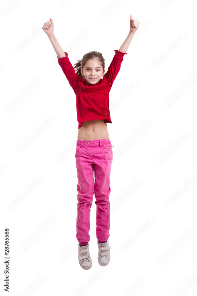 littel girl jumping thumbs up-bambina che salta littel girl jumping thumbs up-bambina che salta