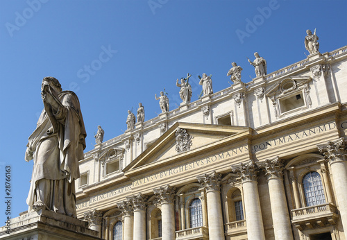 Statue with sword against St.Peter Basilica