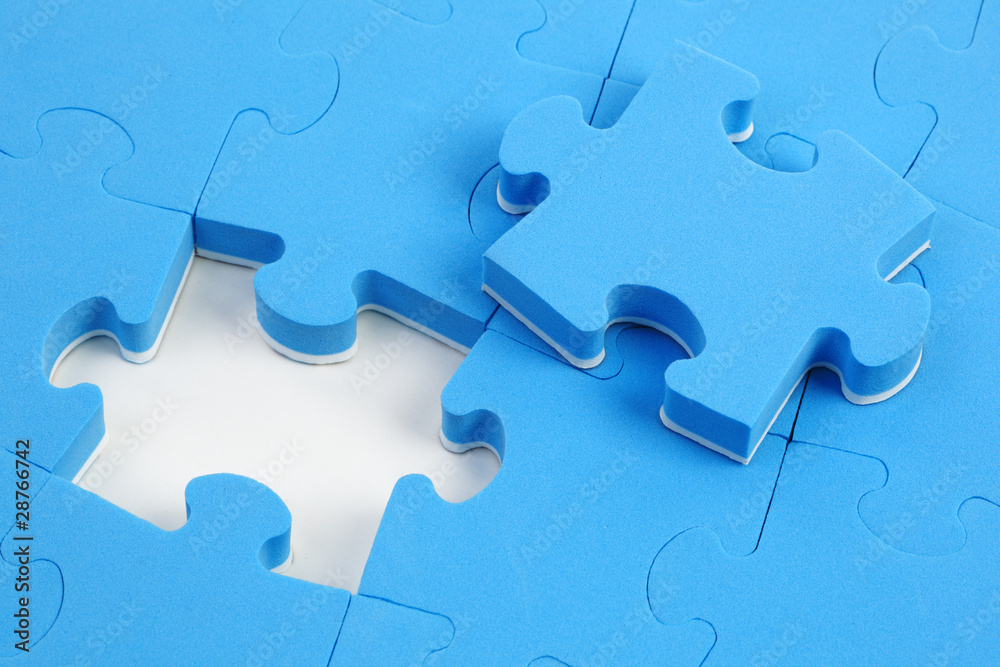 abstract puzzle background with one piece missing abstract puzzle background with one piece missing
