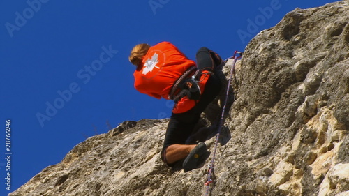 Rock climber reaches top photo