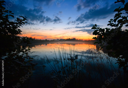 After sunset on the foggy lake © Kushch Dmitry