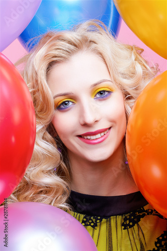 blonde girl with balloons © Serg Zastavkin