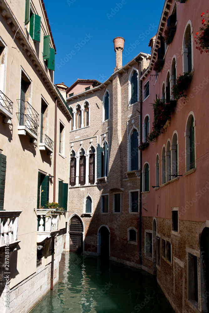 view of a venetian palace with canal