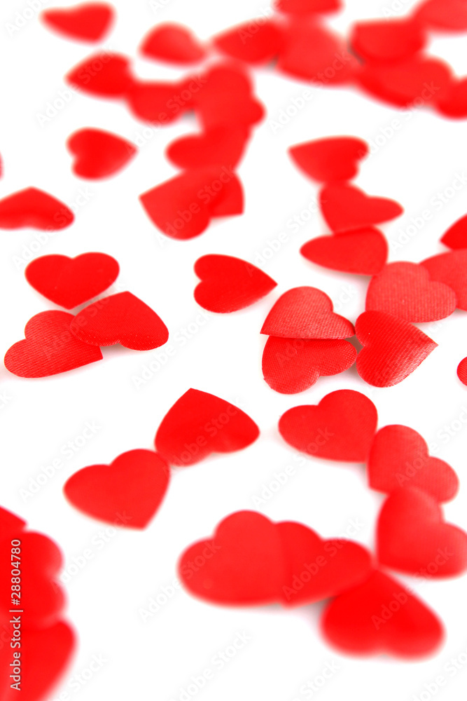 Red hearts confetti on white background Red hearts confetti on white background