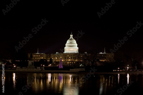 Night Illuminated US Capitol Building with Reflection and Christ