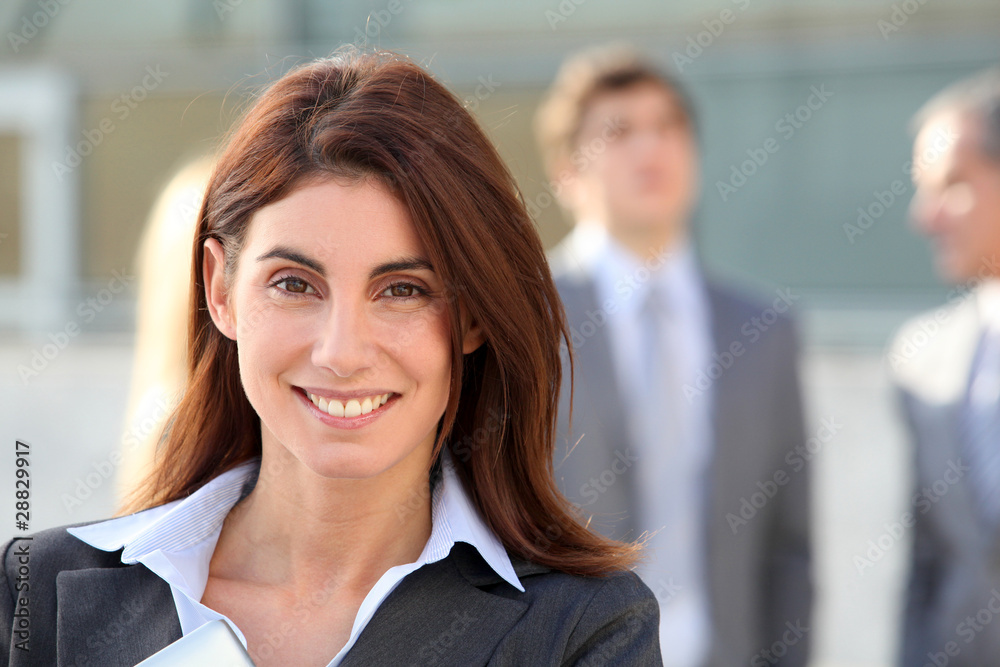 Portrait of businesswoman standing outside Portrait of businesswoman standing outside