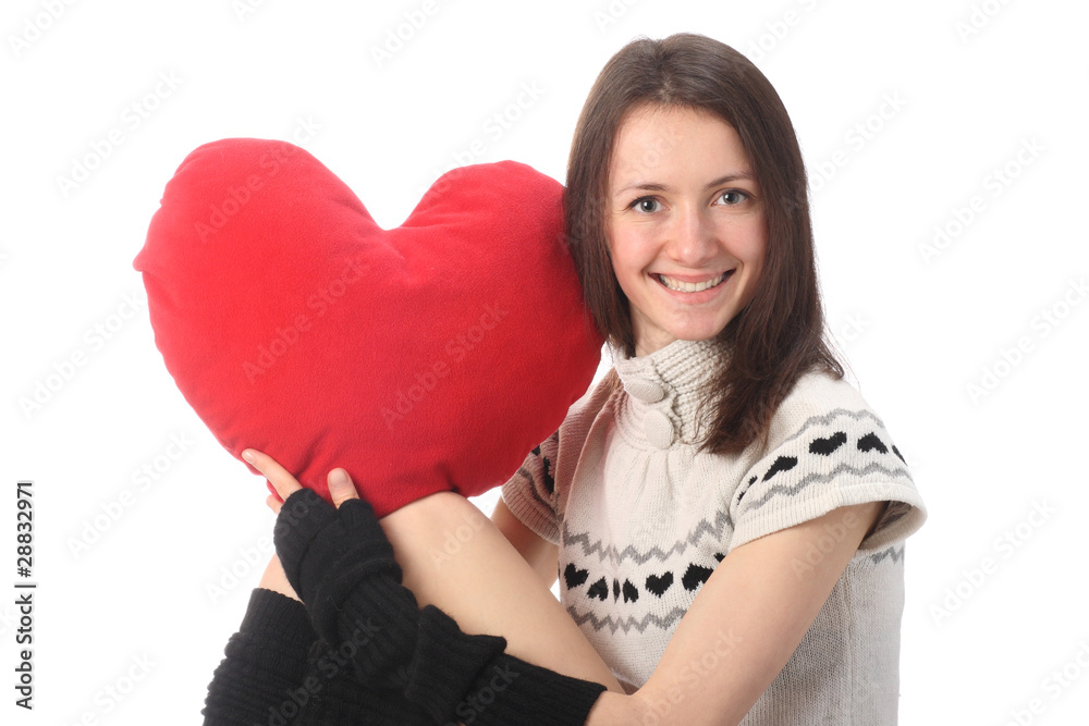 Young fashionable woman holding red heart Young fashionable woman holding red heart