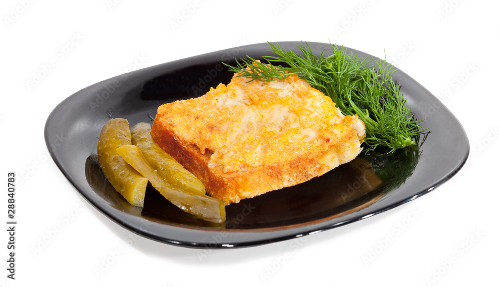 baked chicken sandwich on a black plate isolated on white baked chicken sandwich on a black plate isolated on white