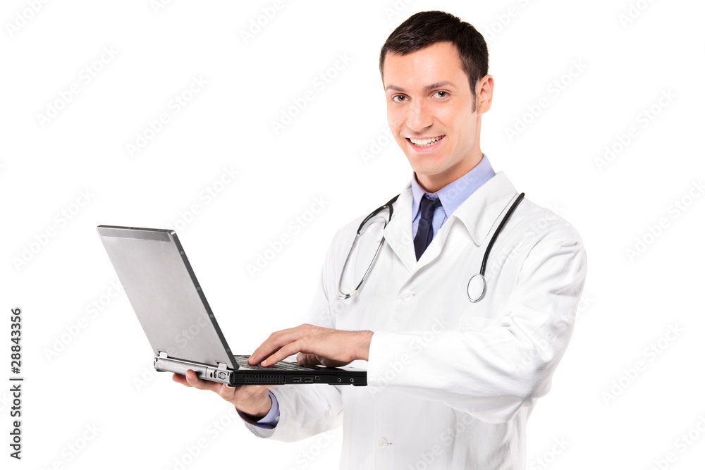 Smiling doctor with stethoscope working on a laptop Smiling doctor with stethoscope working on a laptop