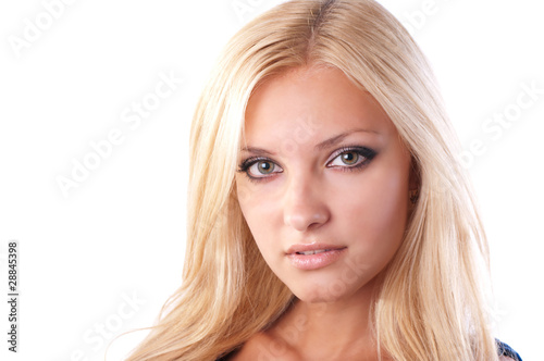 Blonde girl looks sensual eyes.