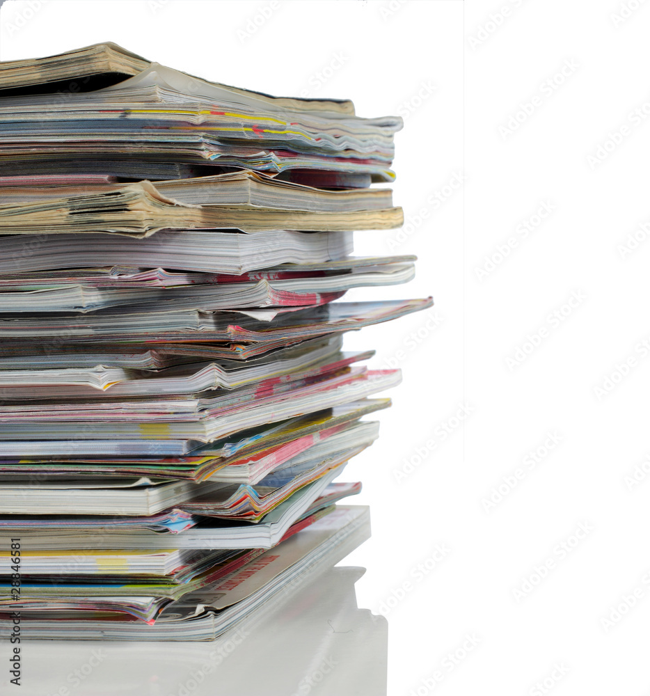 shoot of stack of magazine over white background shoot of stack of magazine over white background