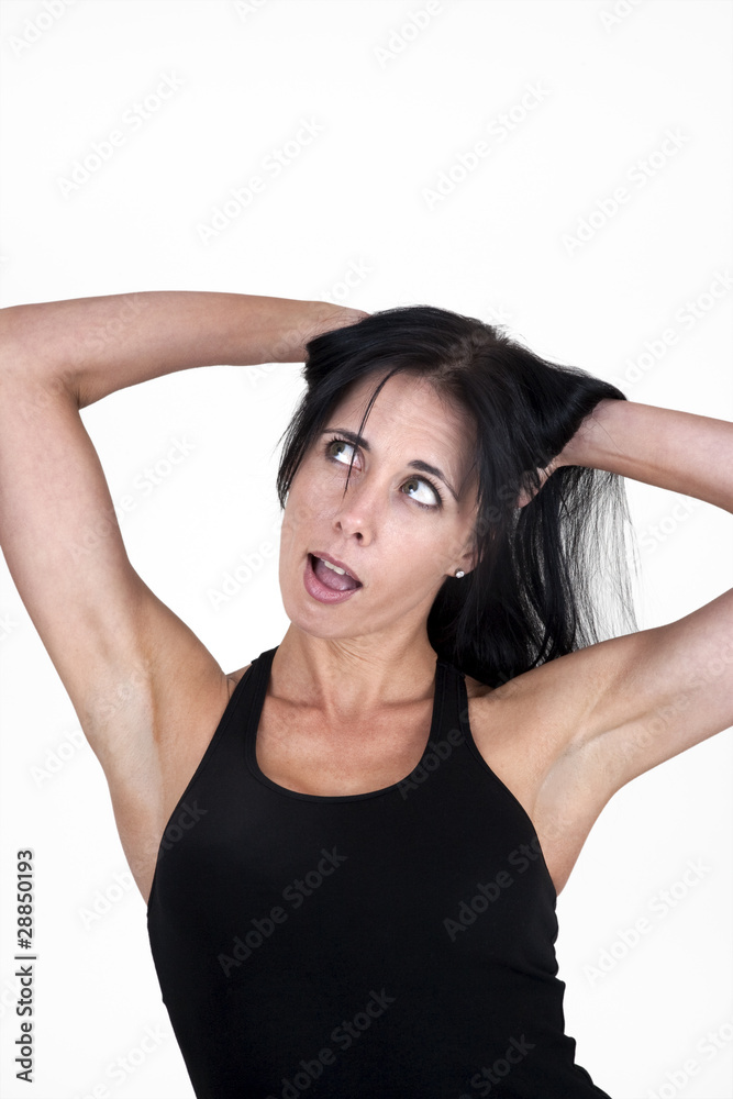 Fototapeta premium Woman with her hands in her hair