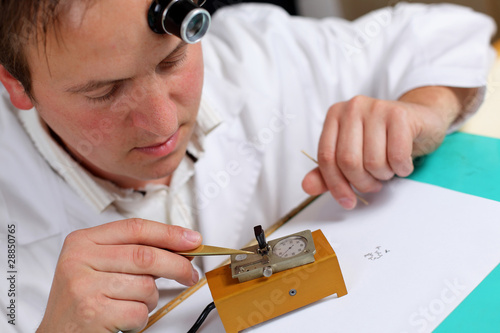 watchmaker in workshop