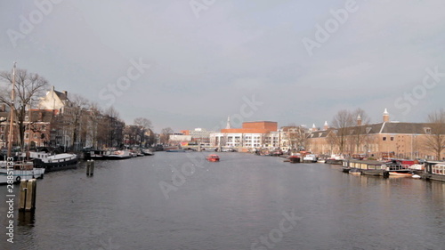 Cruiseboat cruising  in Amsterdam Netherlands at night photo