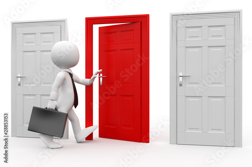Man with briefcase entering a red door