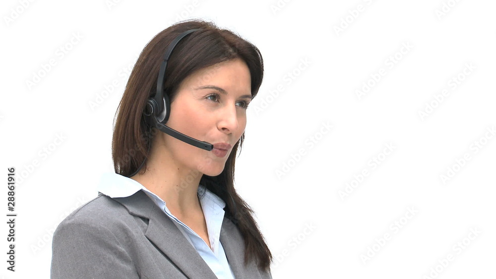 Businesswoman talking on a headset Businesswoman talking on a headset