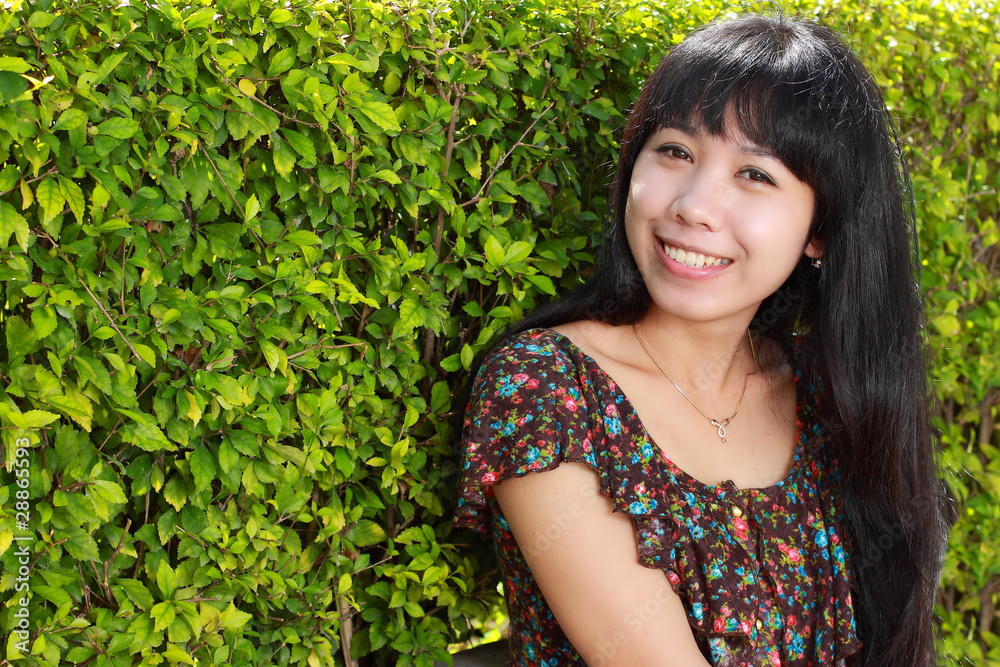 Portrait of the young asian woman outdoors Portrait of the young asian woman outdoors