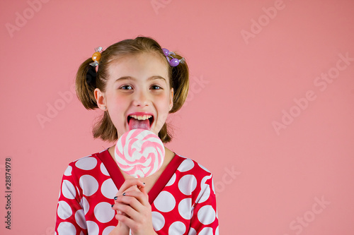 Fotografie kid with a sucker