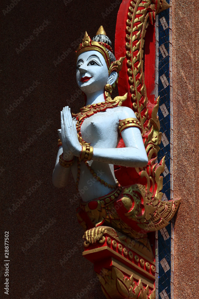 Sculpture of angle on temple roof