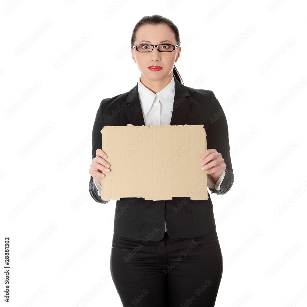 Unemployed businesswoman with empty cardboard sign Unemployed businesswoman with empty cardboard sign