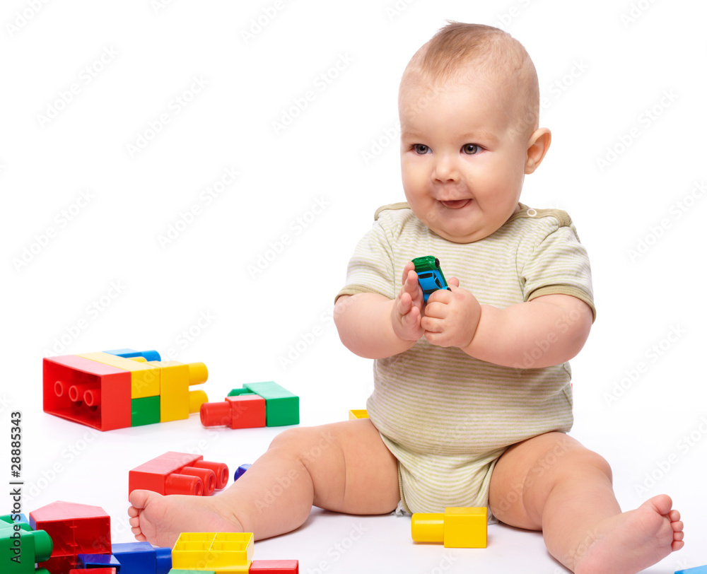 Little boy with building bricks Little boy with building bricks