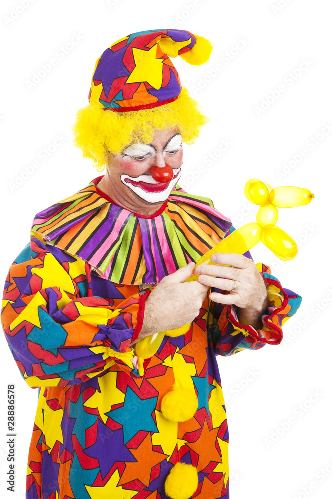 Clown Twists Balloon Into Dog Clown Twists Balloon Into Dog