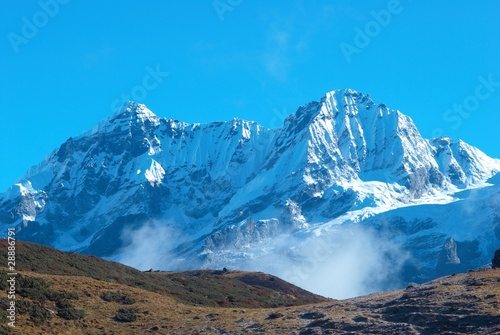 High mountains, covered by snow. photo