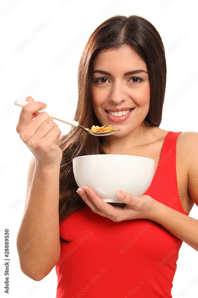 Young girl beautiful smile eating breakfast cereal Young girl beautiful smile eating breakfast cereal