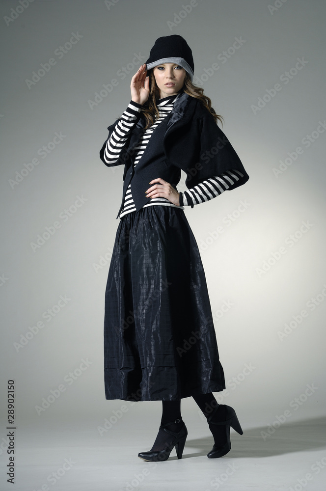 Beautiful fashion model posing in the studio Beautiful fashion model posing in the studio