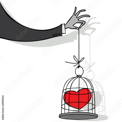 Man's hand with the heart in a cage