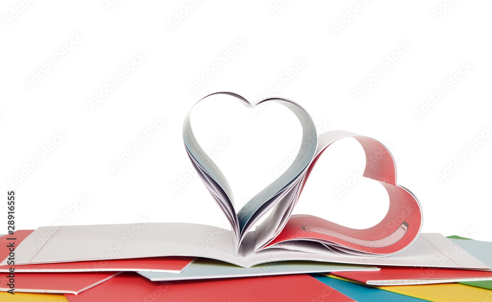 Opened book and heart shape Opened book and heart shape