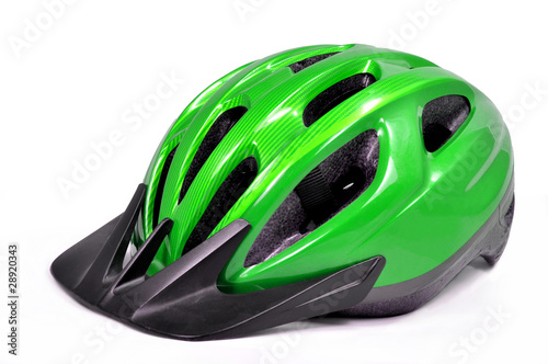 green bicycle cross country plastic helmet isolated on white