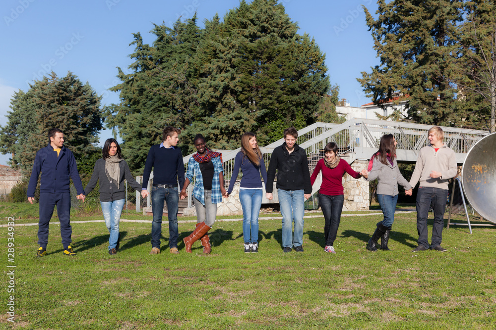 Obraz premium Group of Young College Students at Park