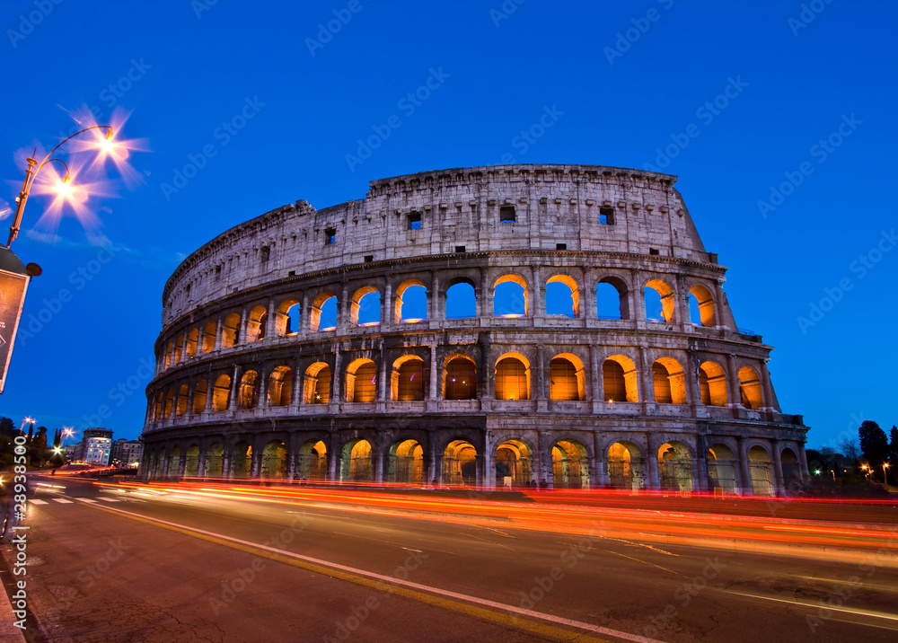 Colosseum at dusk from in front of Metro, Rome Italy.