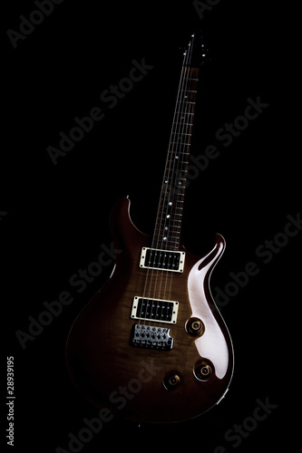 Electric guitar isolated on the black background