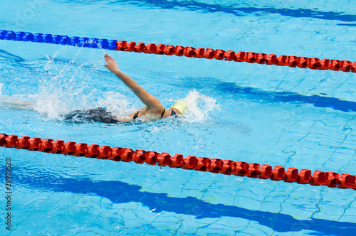 swimmer swimming in a pool