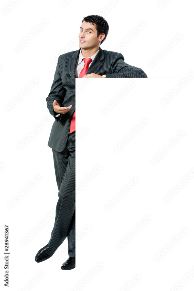 Full body portrait of businessman with signboard, on white Full body portrait of businessman with signboard, on white
