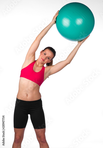 woman exercise with pilates ball