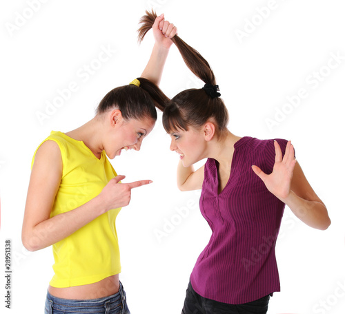 Two young women fighting Fototapeta
