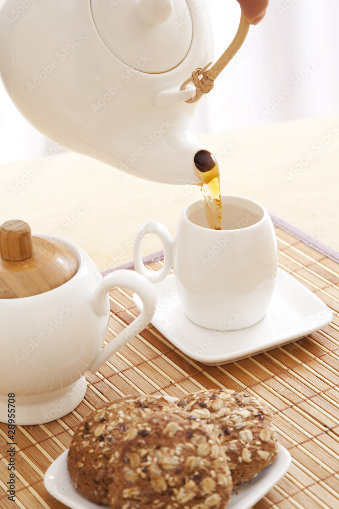 Pouring a tea Pouring a tea